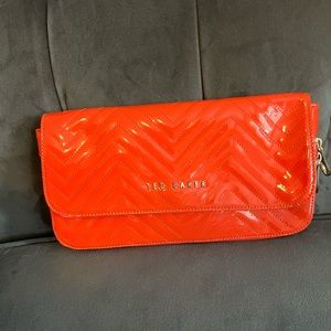 Ted Baker bright orange clutch